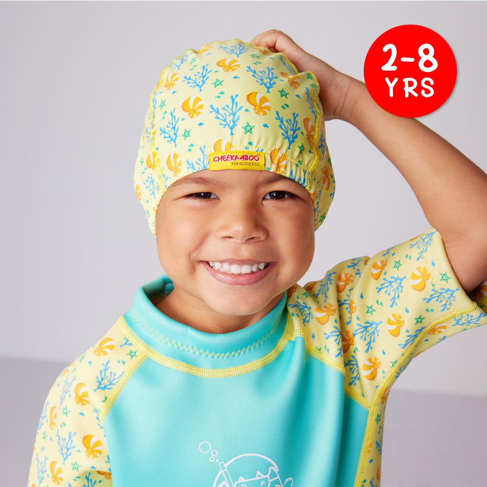 A kid wearing the Yellow Swim Cap