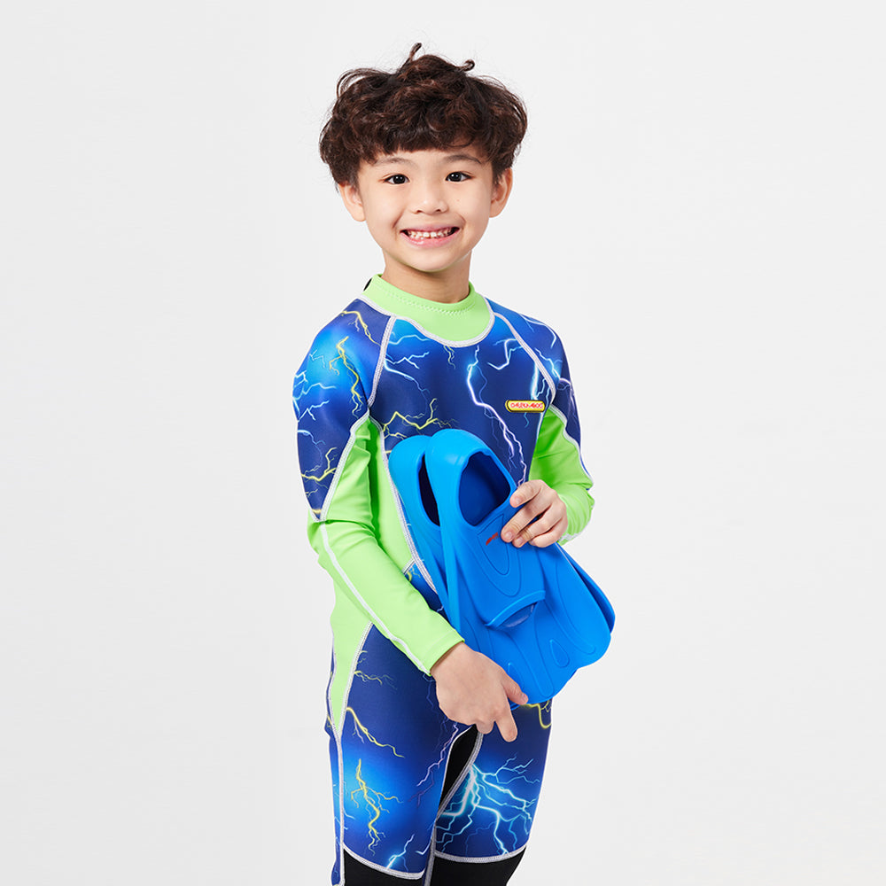 A boy holding Cheekaaboo's Silicone Swim Fins
