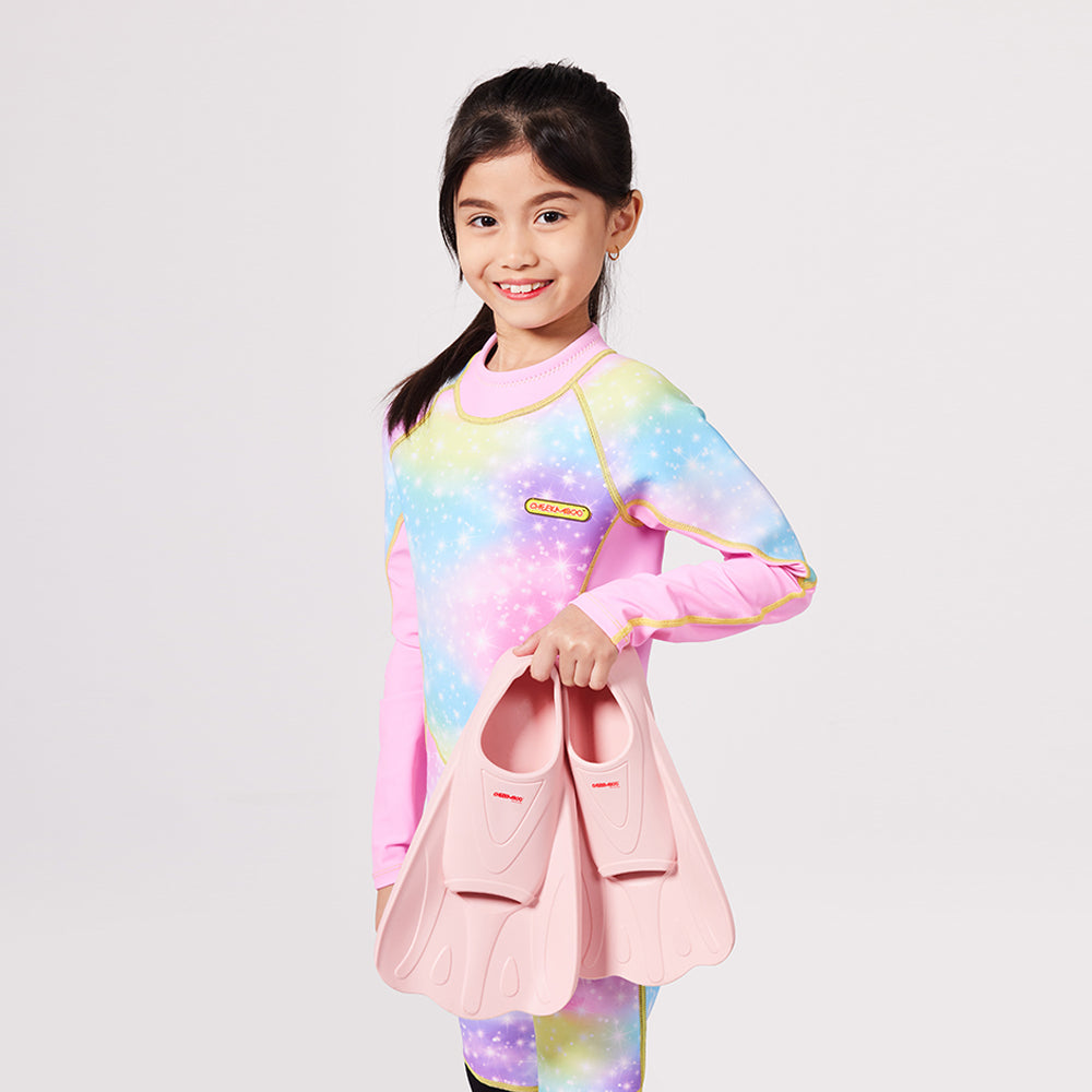 A girl holding the Silicone Pink Swimming Fins