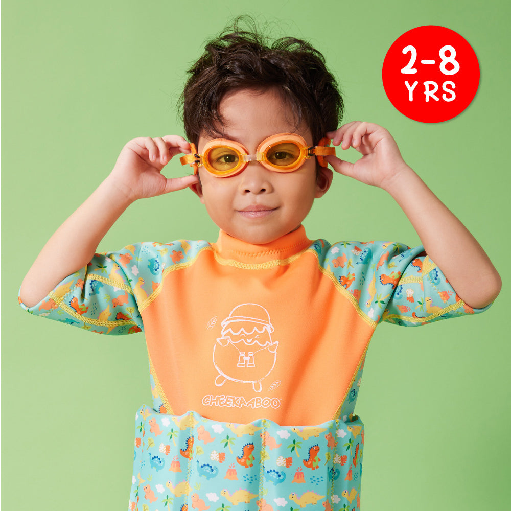 A Kid Wearing Pool Goggles with Neoprene Head Strap in Orange Dino