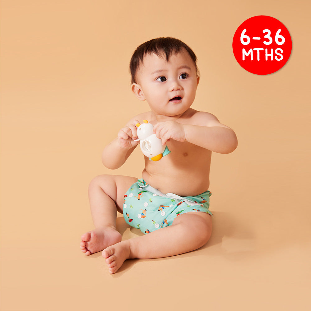 A Baby Wearing the Reusable Waterproof Diapers