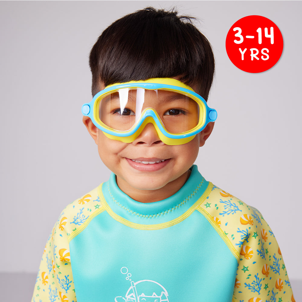 A Kid Wearing Cheekaaboo's Comfortable Goggles for Children - Blue and Yellow